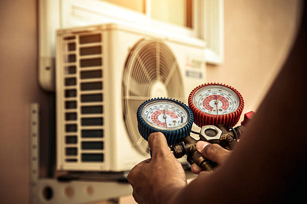 Professional Air Conditioning Service technician working in Bankston, AL